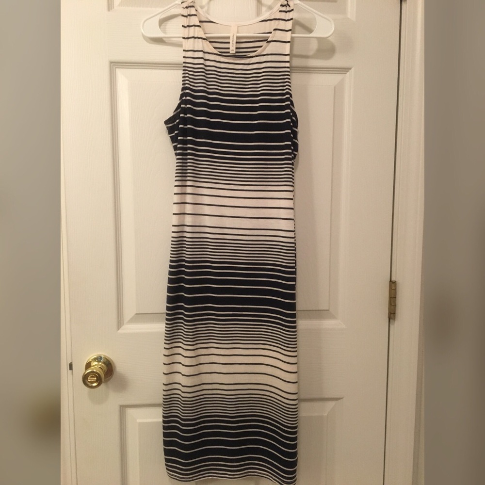 Fitted cream and navy horizontal stripped dress.